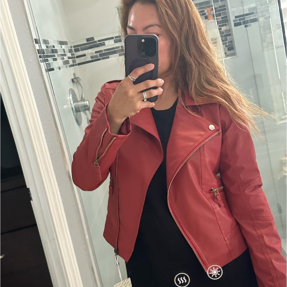 Very cute  kinda leather jacket